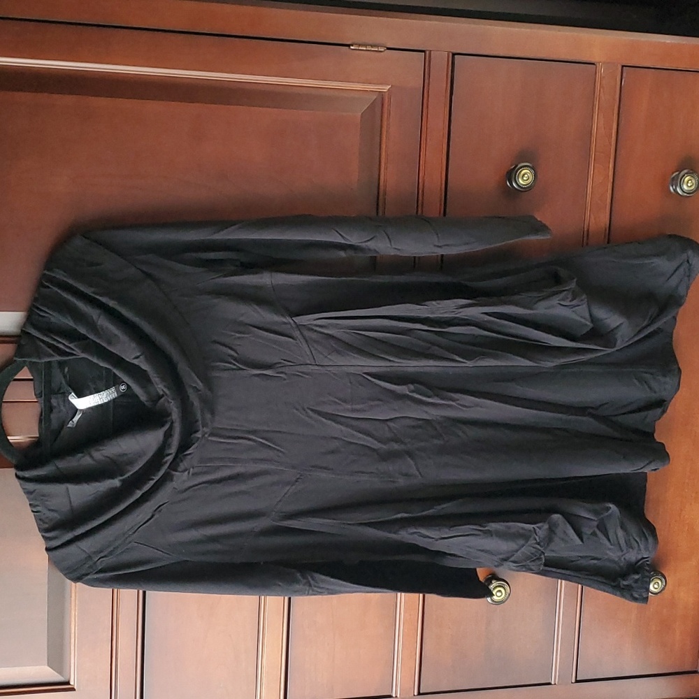 Kensi - Black long sleeve dress with pockets. 95% Viscose and 5% Elastane, small